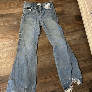 Distressed Blue Denim Jeans